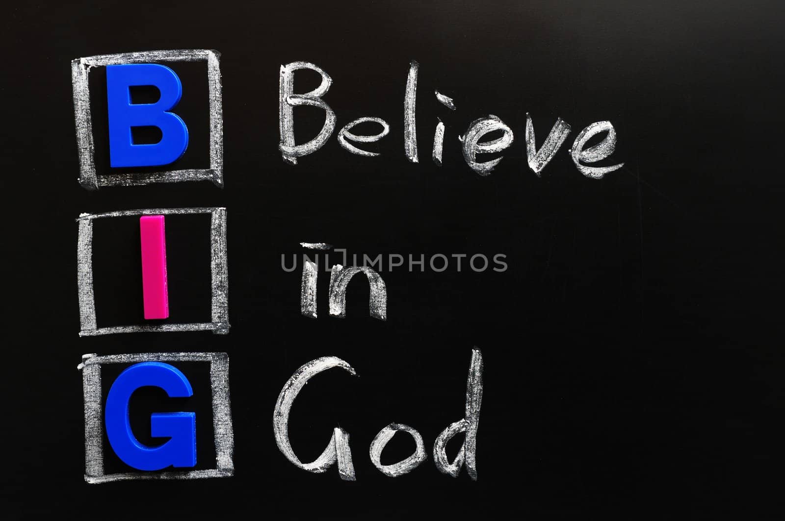 Acronym of BIG on a blackboard - Believe in God 