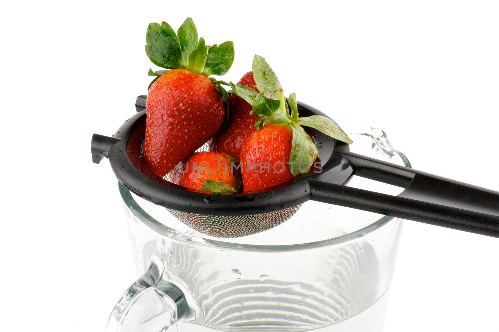 Colander with strawberry by zhekos