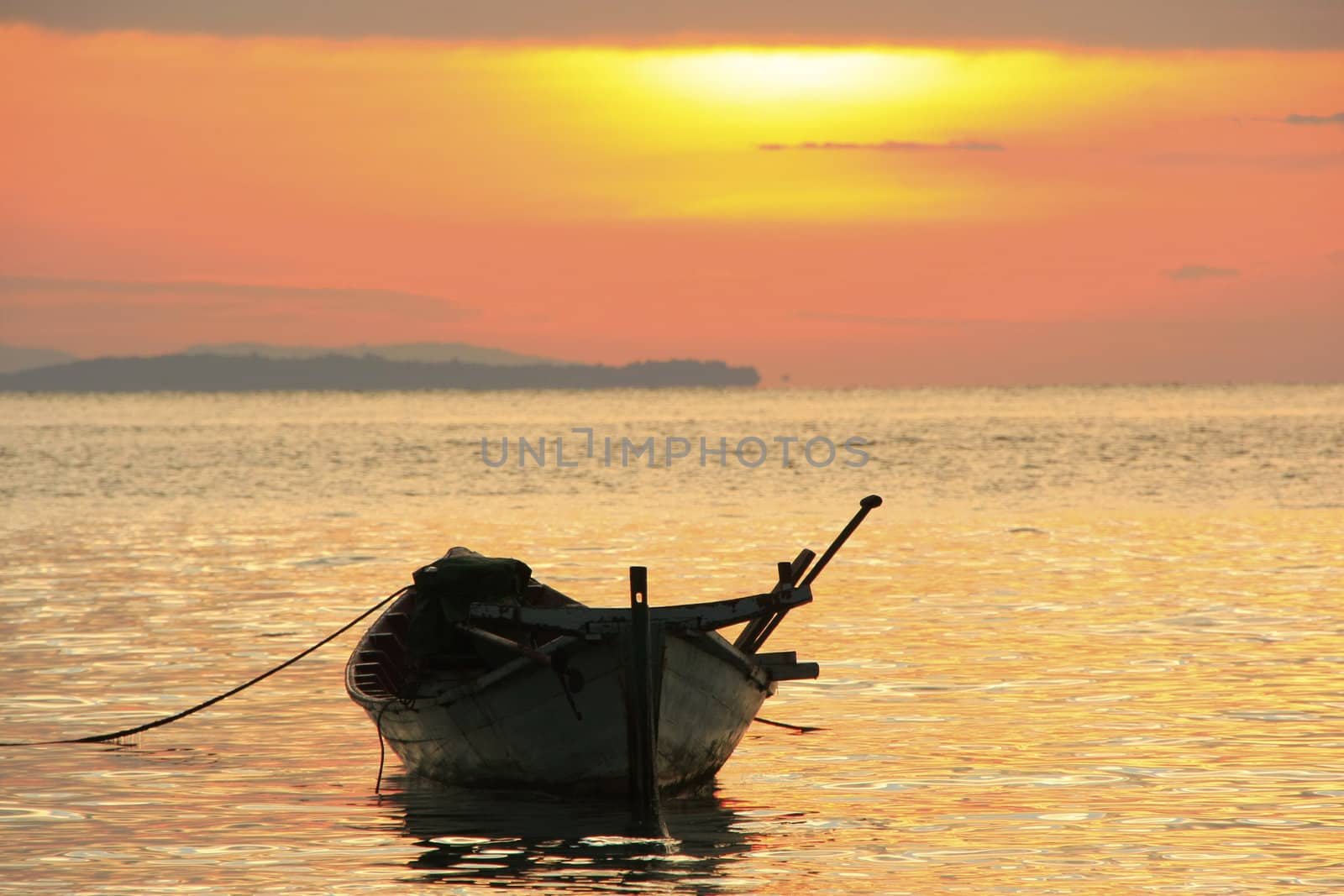 Silhouette of traditional fishing boat at sunrise, Koh Rong island, Cambodia, Southeast Asia