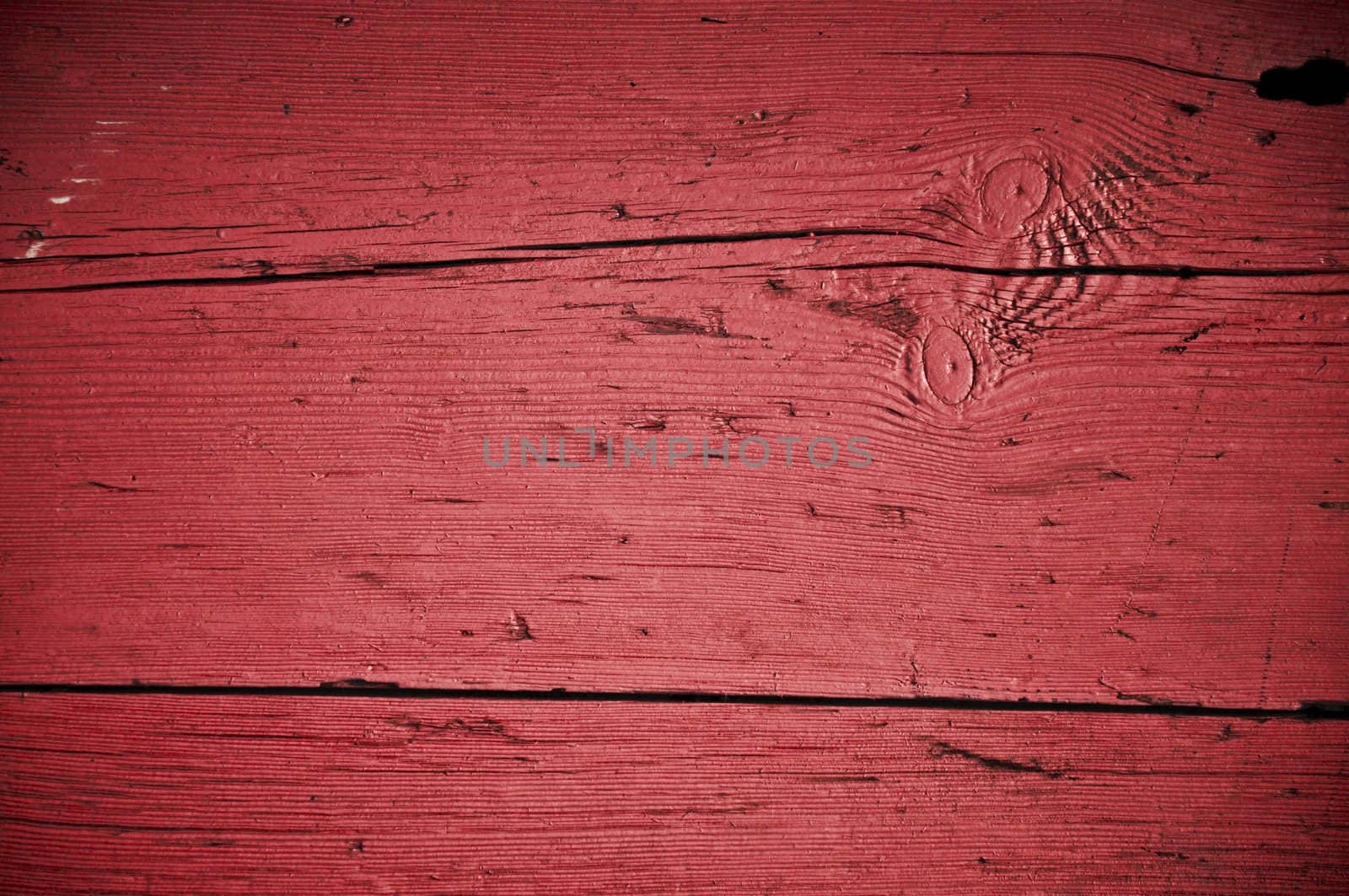Red grungy texture of an old Turkish door