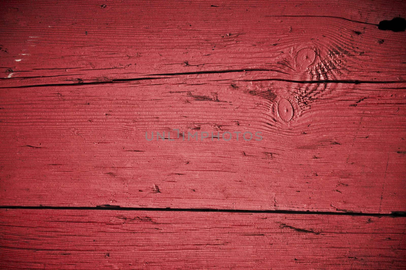 Red grungy texture of an old Turkish door