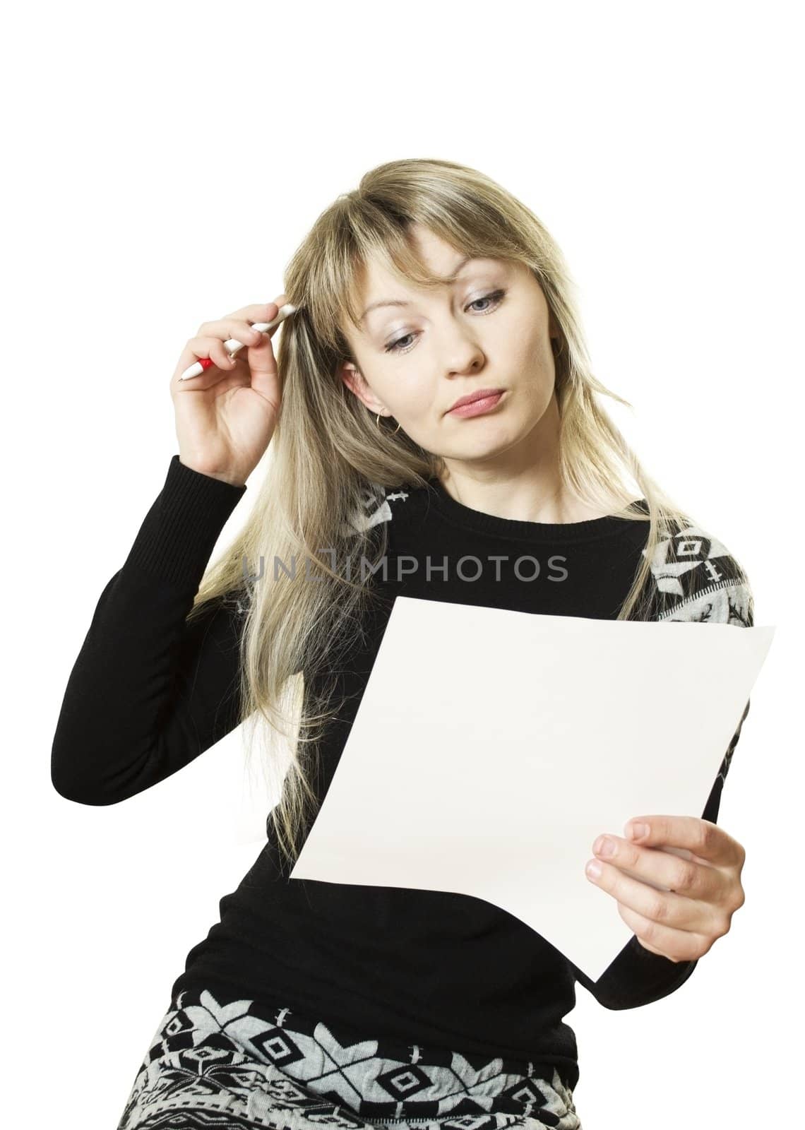 beautiful girl with long blond hair thought that writing on paper