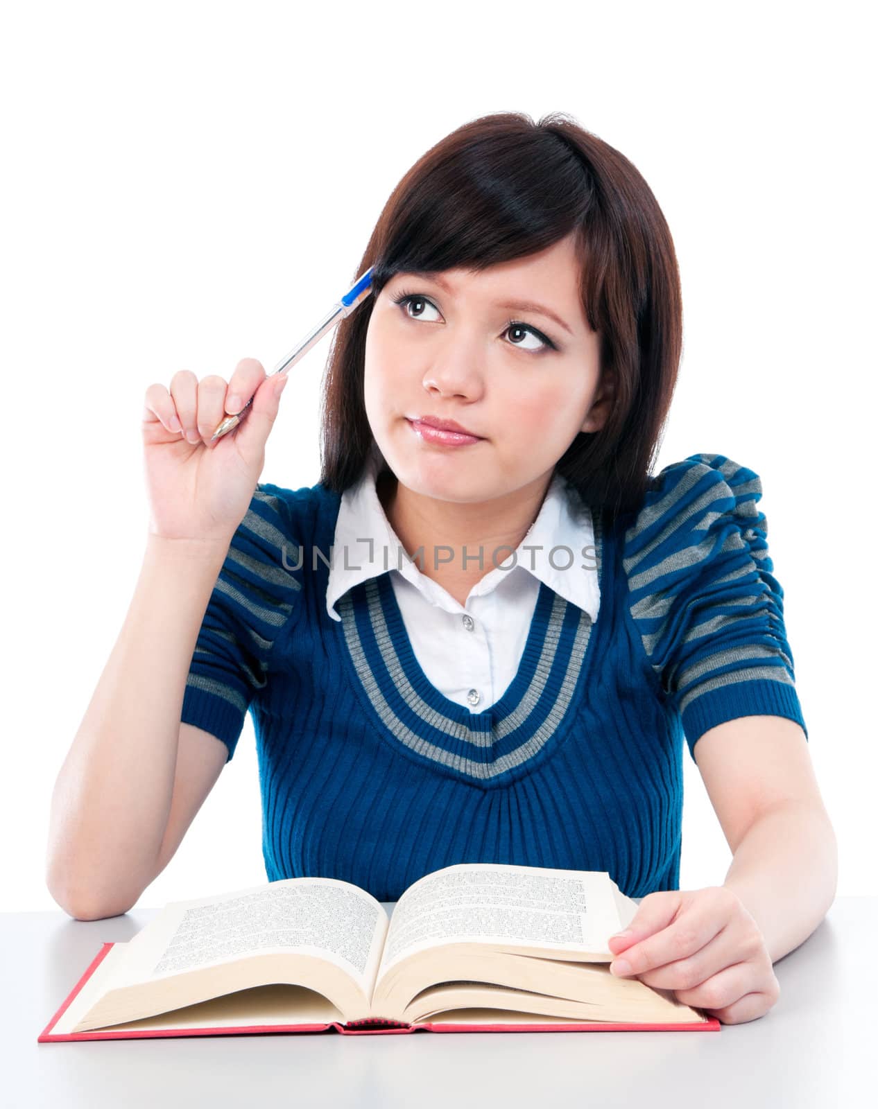 Portrait of an attractive Asian female student thinking.
