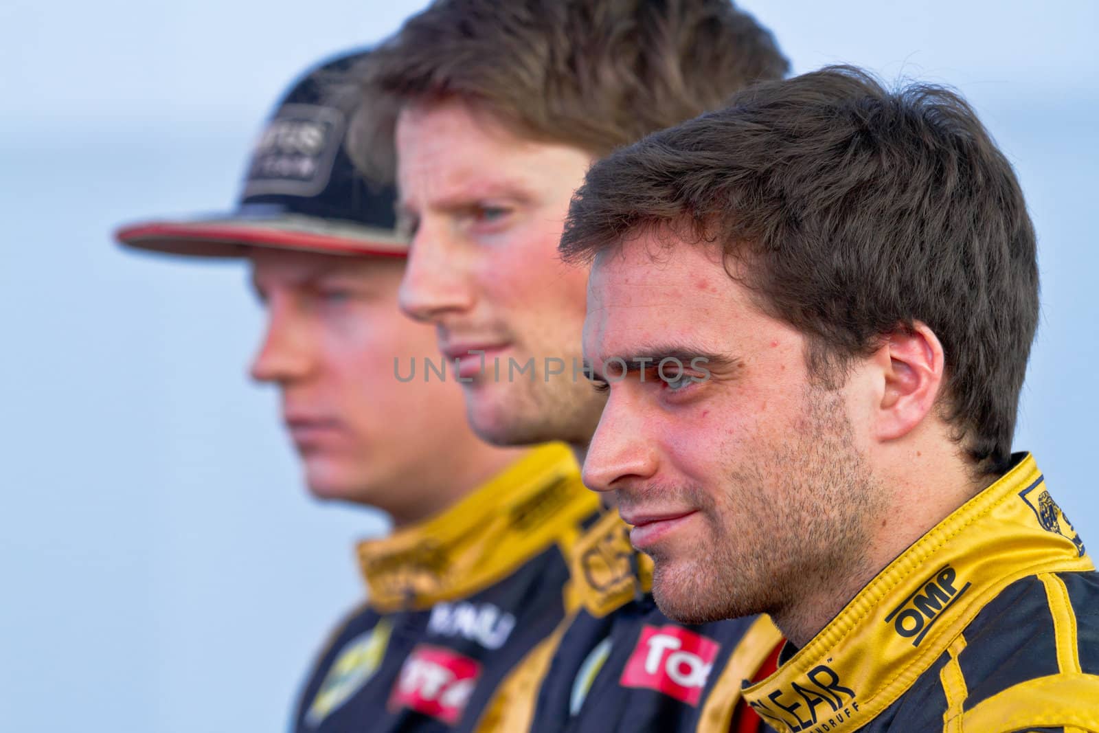 JEREZ DE LA FRONTERA, SPAIN - FEB 06: D'Ambrosio, Grosjean and Raikkonen of Lotus Renault F1 on the presentation of the F1 Car E20 on February 06 , 2012, in Jerez de la Frontera , Spain