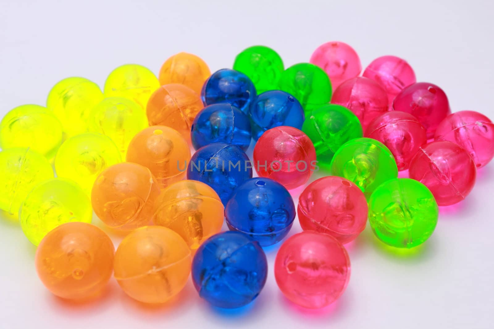 Coloured balls on white background