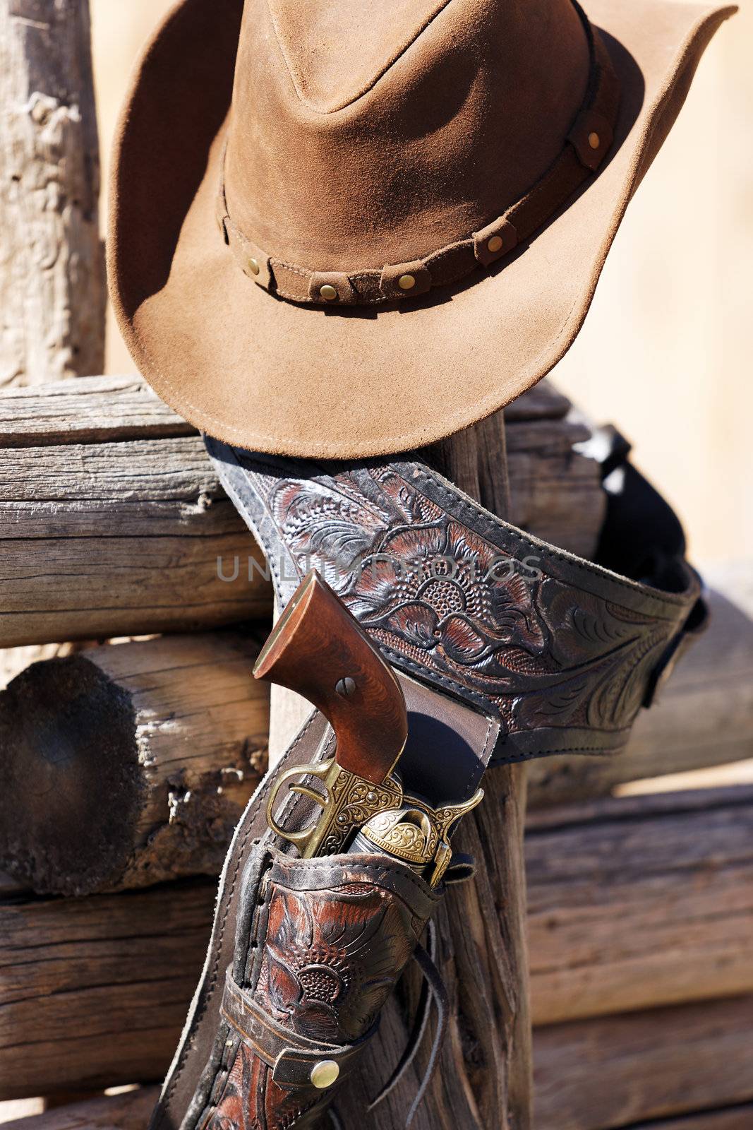 gun and hat under sunlight outdoor