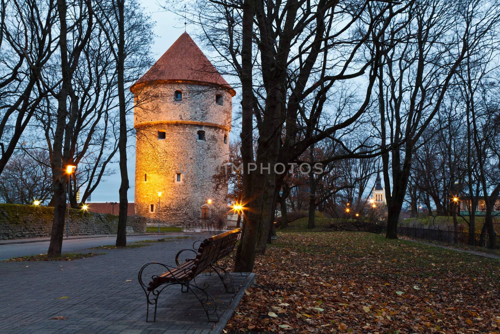 Illuminated Tower in the Old Town of Tallinn , Estonia
