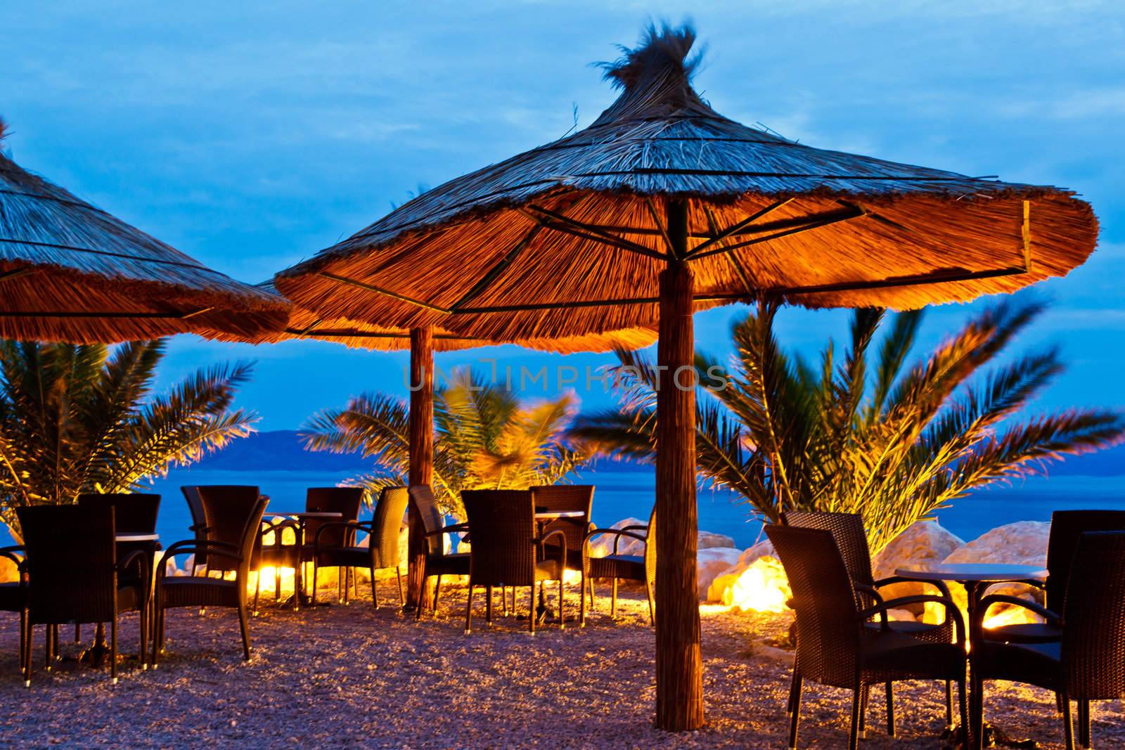 Umbrellas on Pebble Beach at Night, Brela, Croatia