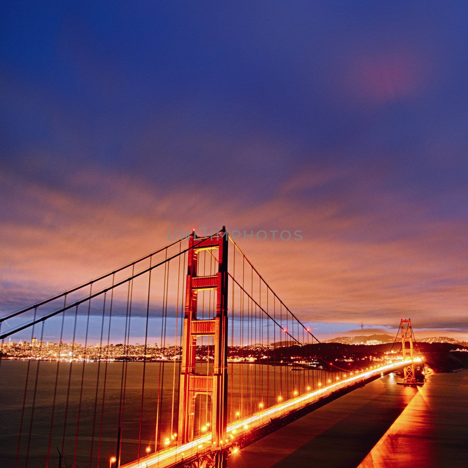 Night scene with Golden Gate Bridge and San Francisco lights