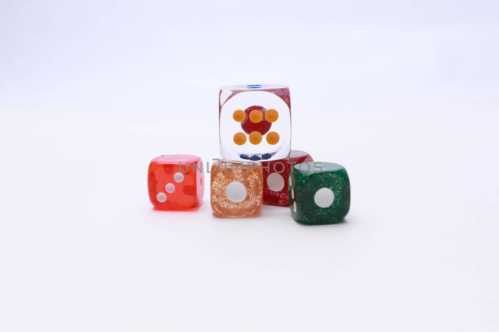 5 coloured dices on white background