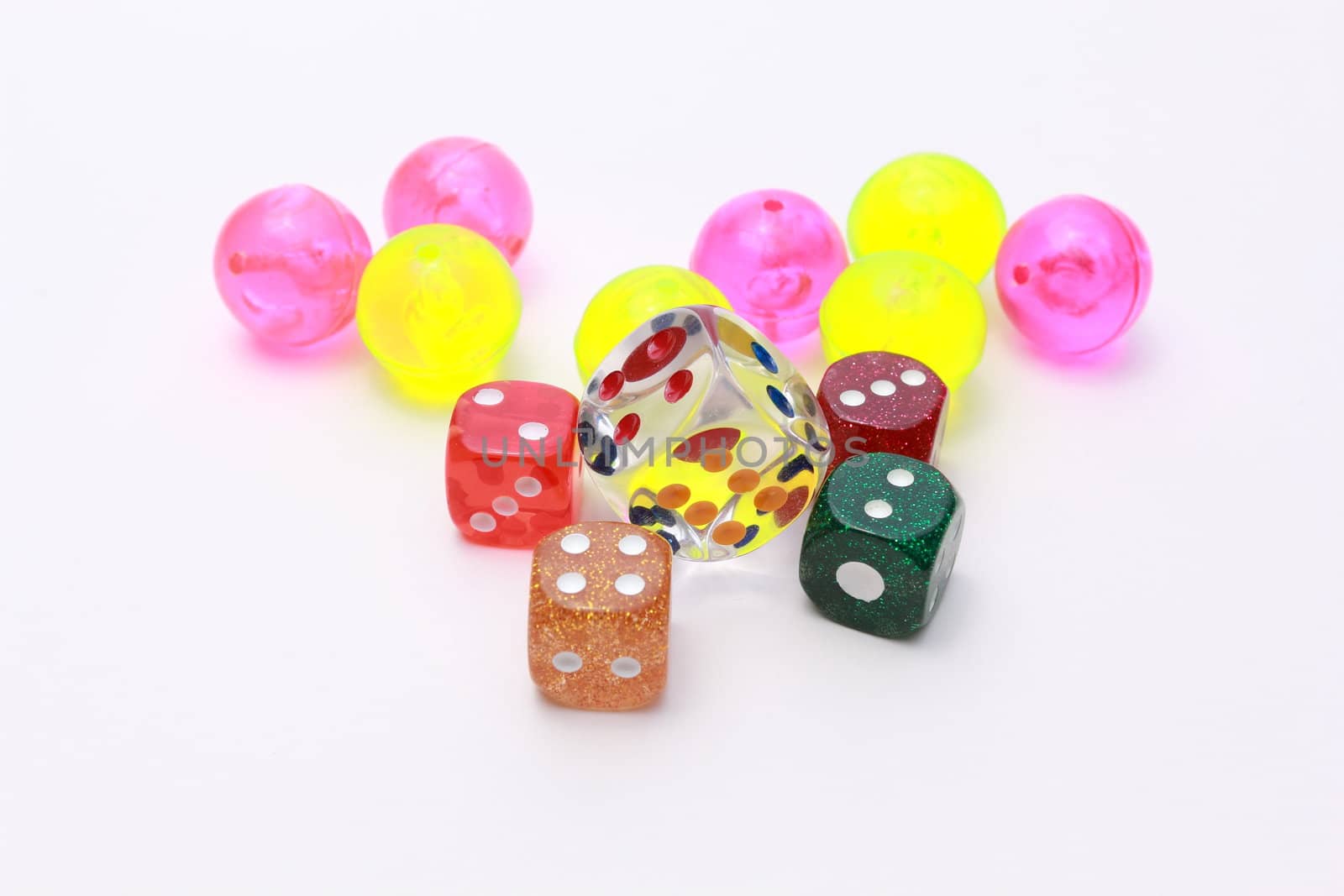 5 coloured dices with coloured balls on white background