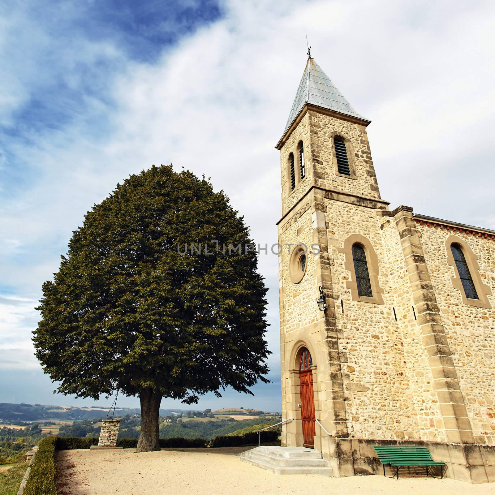 little church in old french town in summer