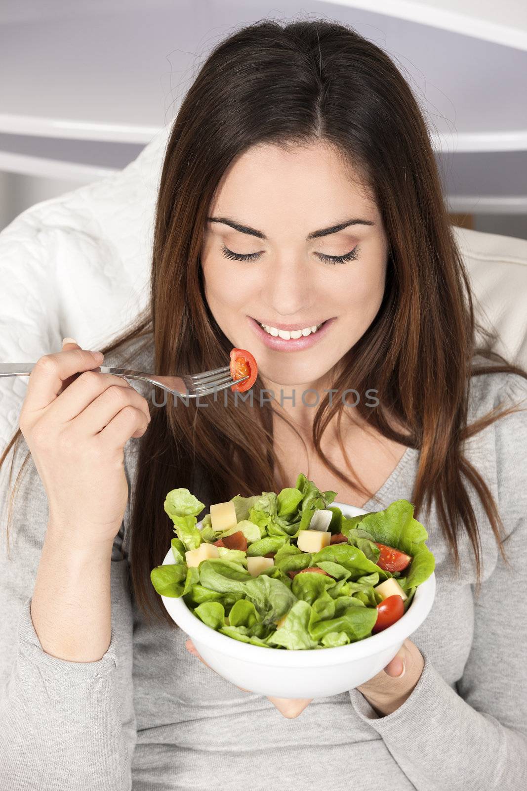 Young girl eating healthy food 