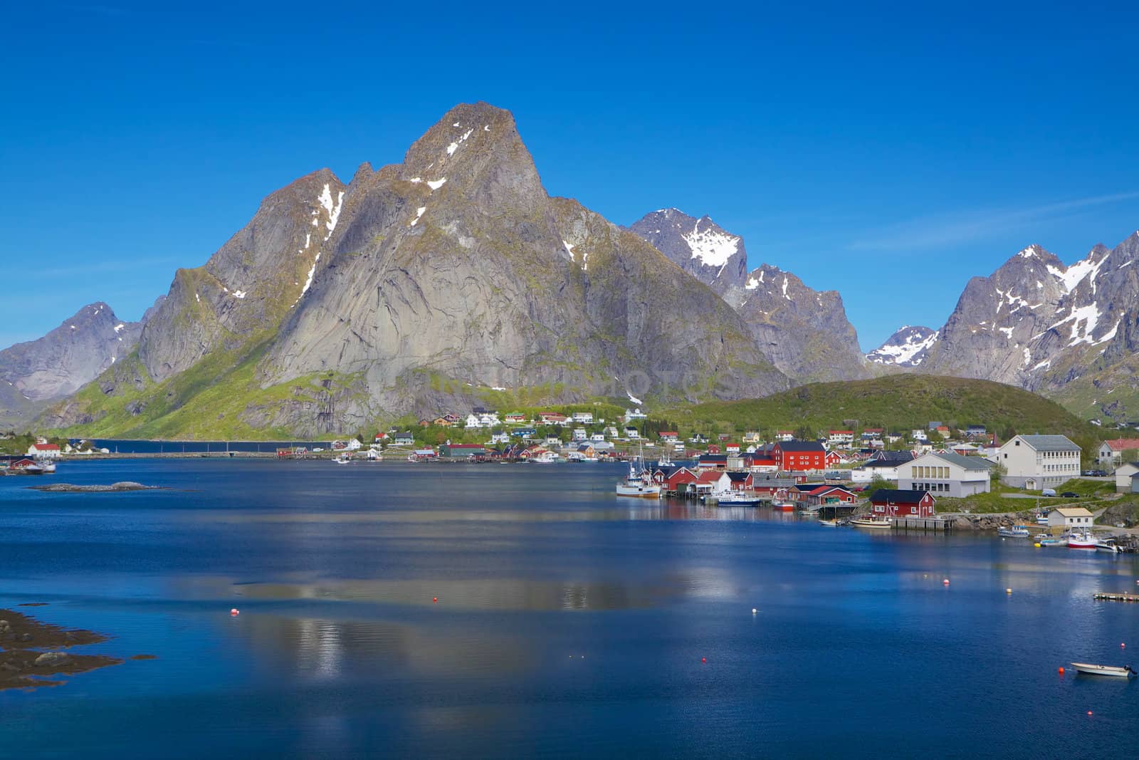 Picturesque fishing town of Reine by the fjord on Lofoten islands in Norway