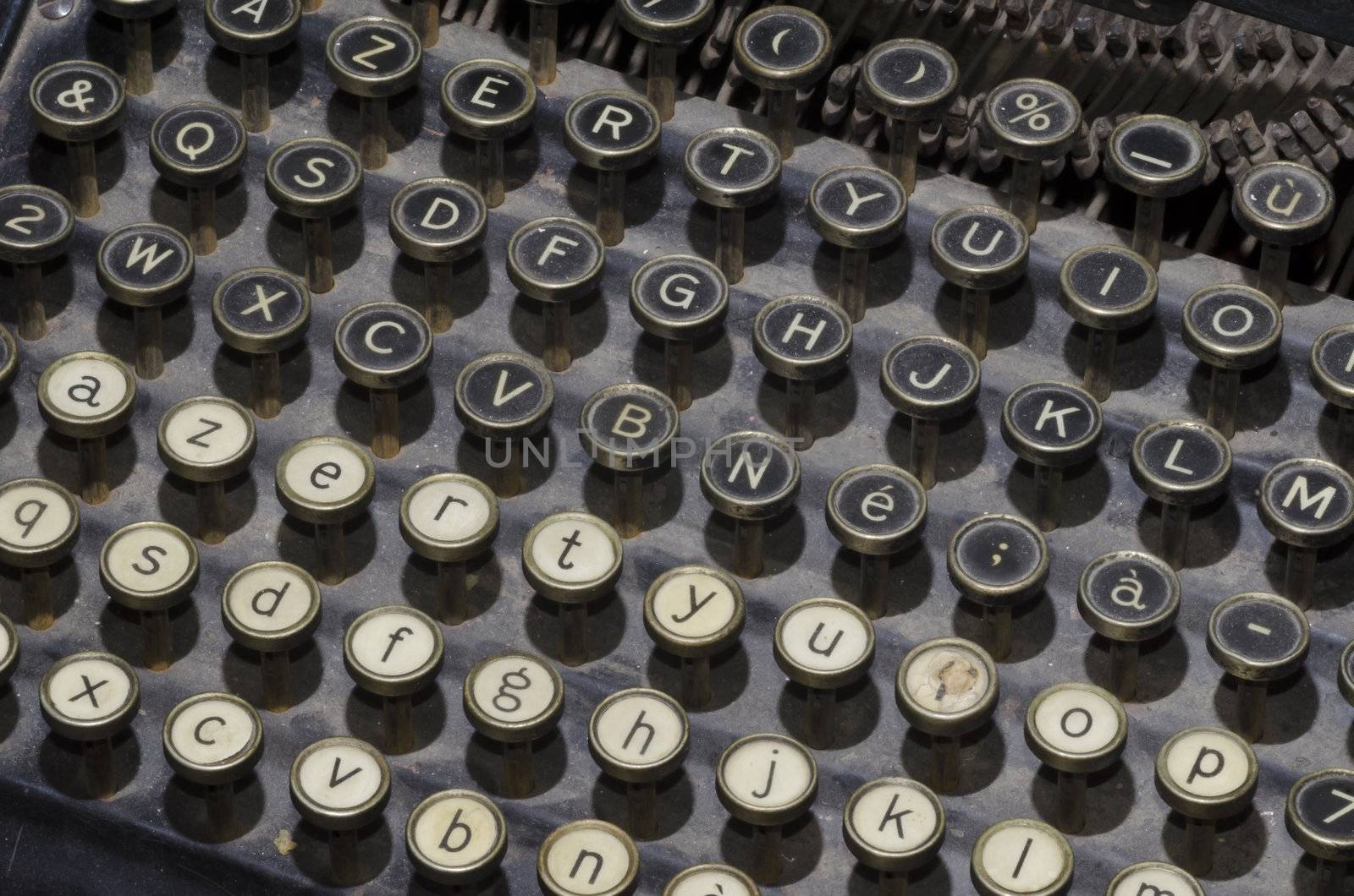 old typewriter with black and white keys