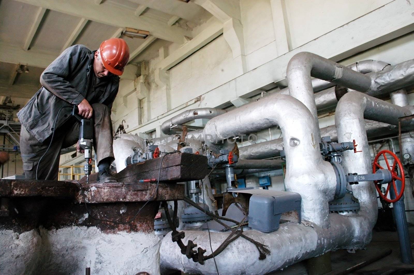 POLTAVA, UKRAINE - SEP 08:  Worker at Poltava " Diesel Locomotive Plant" during open doors day on September 08, 2009 in Polava, Ukraine