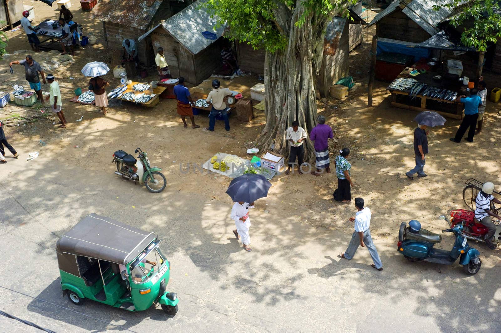 Galle, Sri Lanka - January 26, 2011: Aerial view on busy Sri Lankan street in Galle. Galle is the main city in  south of Sri Lanka, with a population of around 100 000.