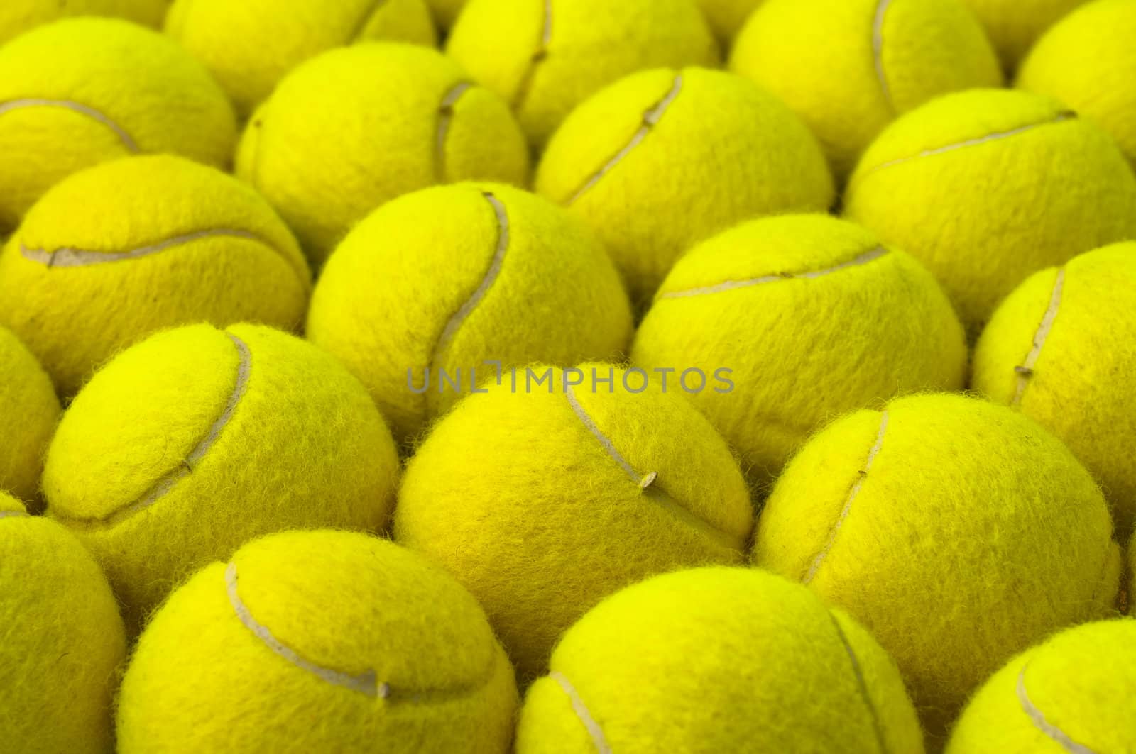 Yellow pattern, made with tennis balls, placed in rows