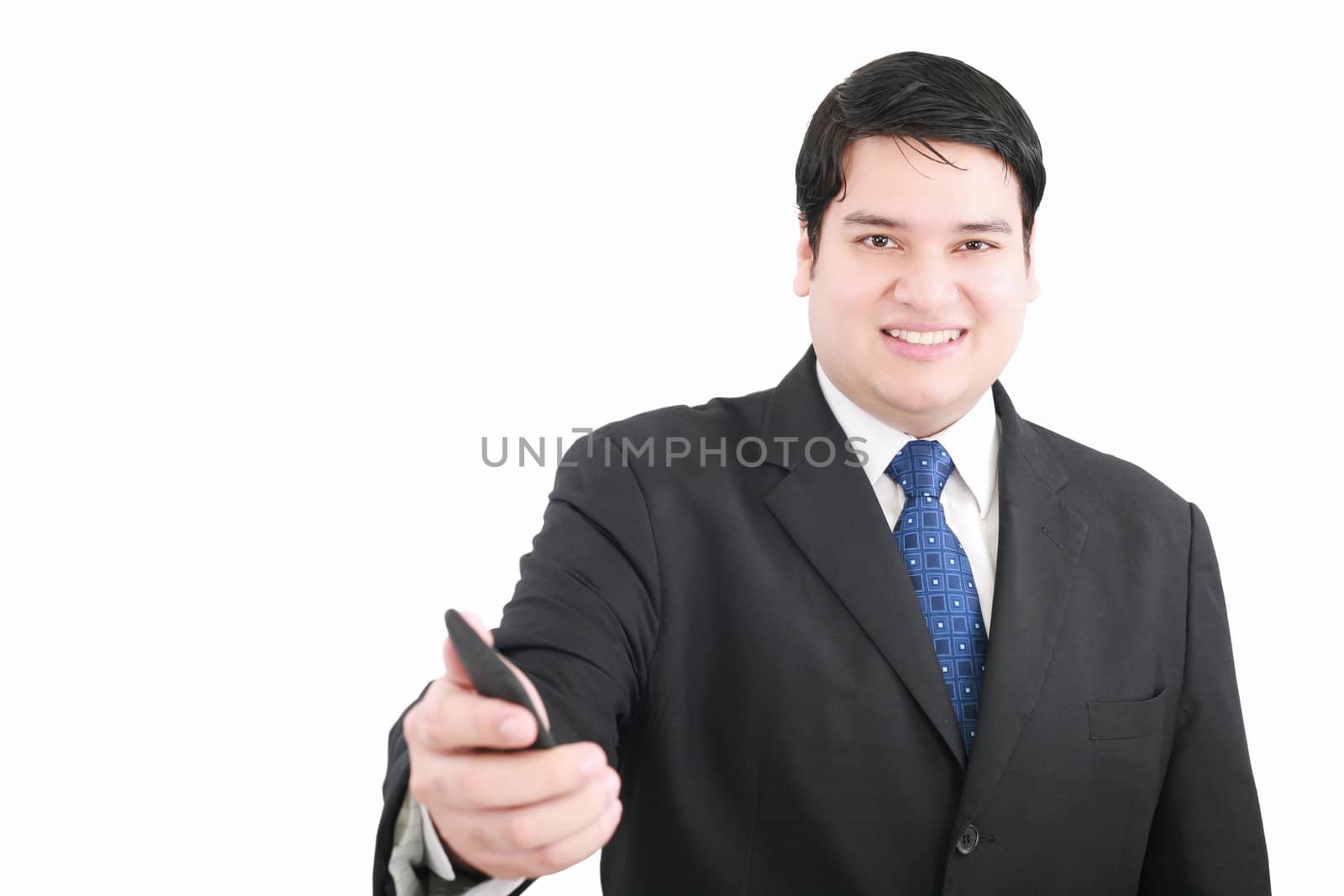 Handsome young man in a suit giving you a mobile by dacasdo