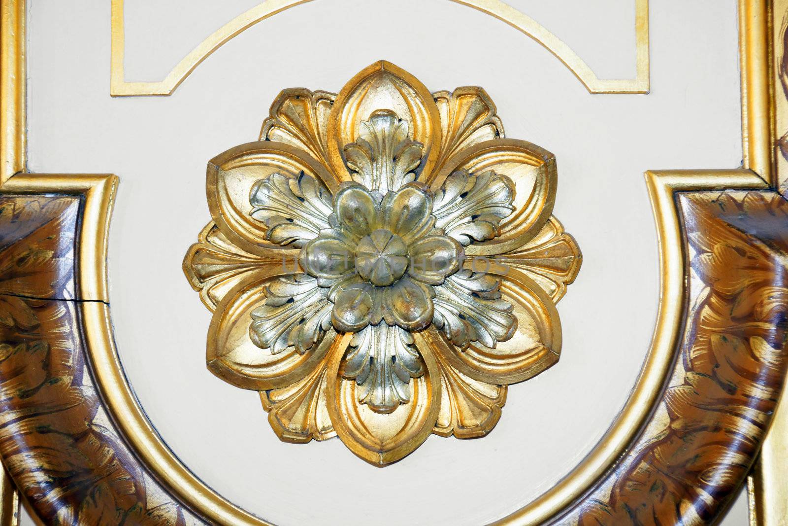 Great vintage rosette detail on the door of an historical european building.