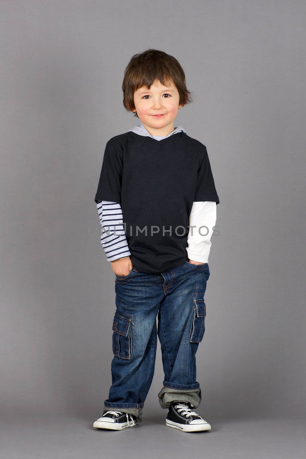 Boy with hands in pockets by Mirage3