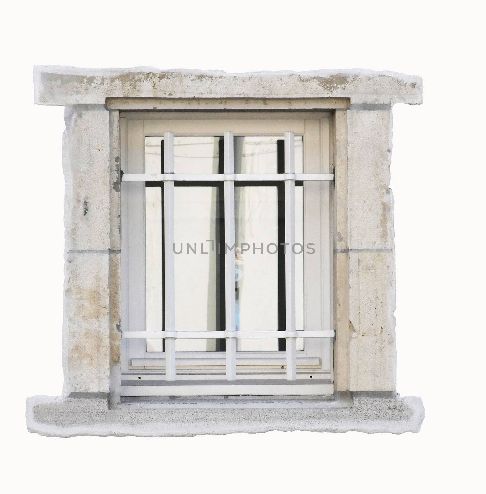 Little window isolated with white bars and clear stone