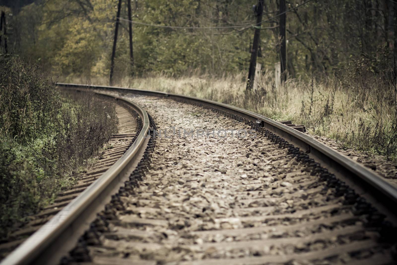 retro train railroad disappearing in the distance