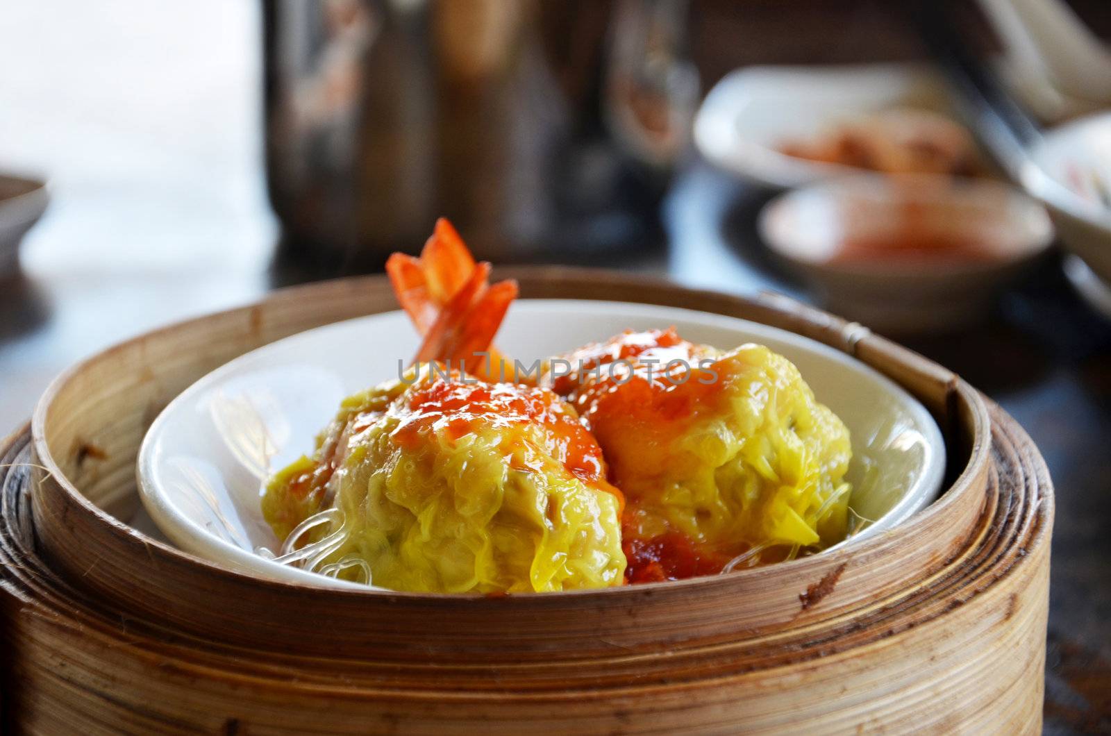 Steamed shrimp dumplings dim sum , cellophane noodle and delicious sauce