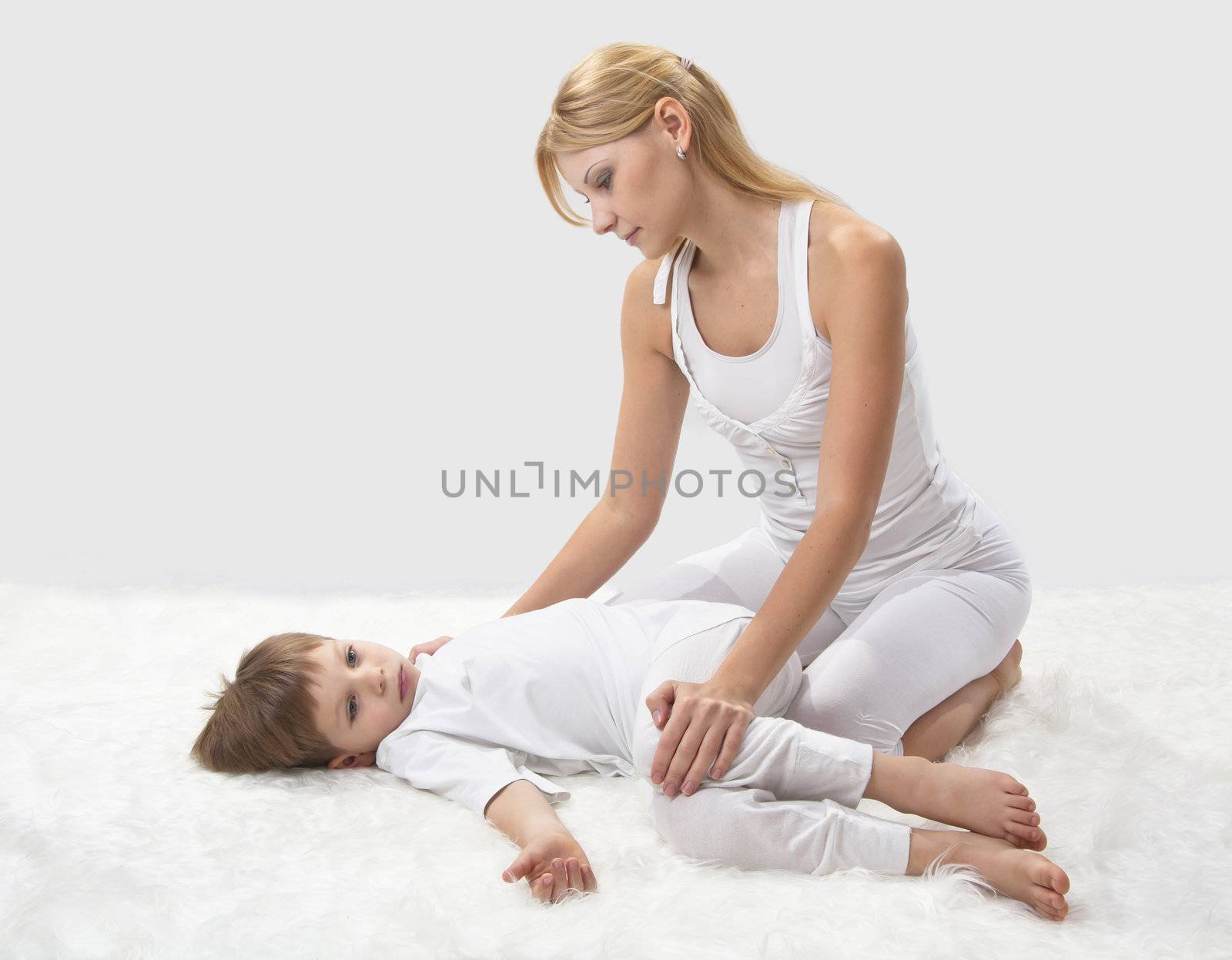 Mother and son do yoga before bed  by NickNick