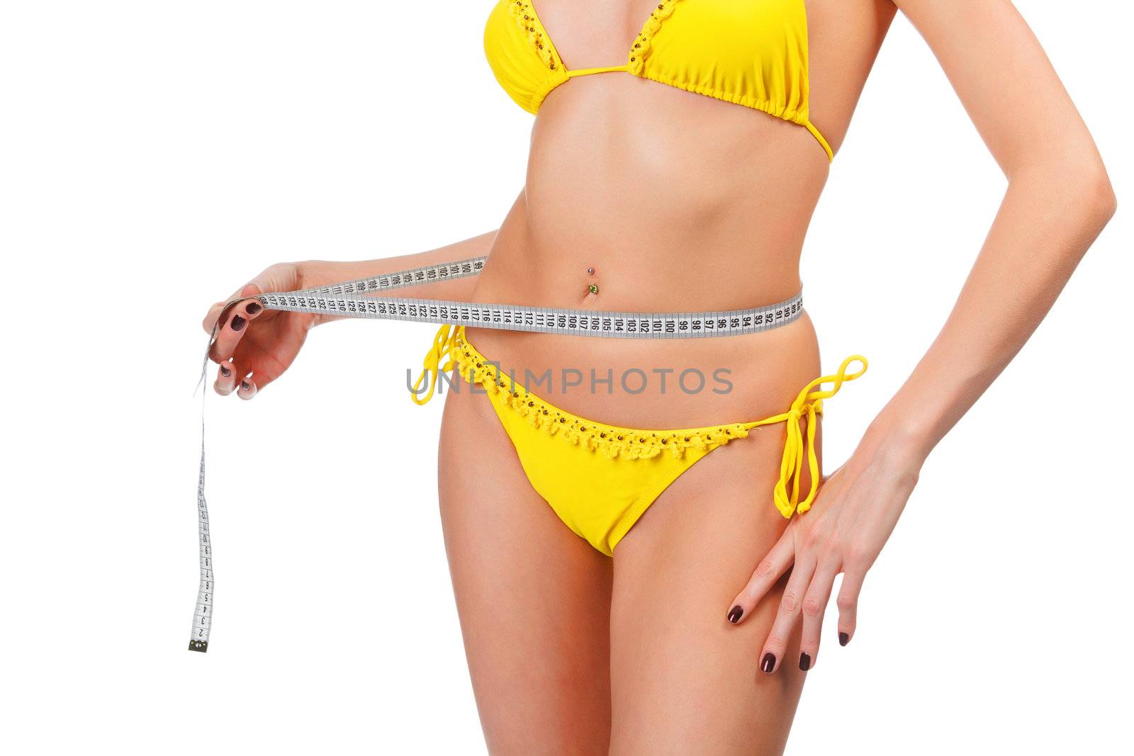 Beautiful woman measuring her waist, isolated on white backgroun by Nobilior