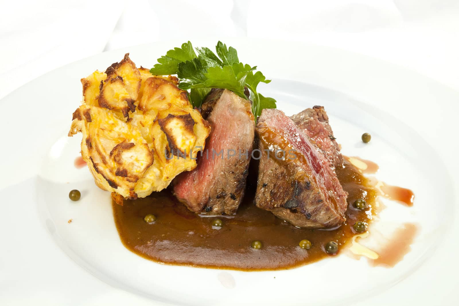 Grilled Sirloin with pepper sauce and grilled potatoes by hanusst