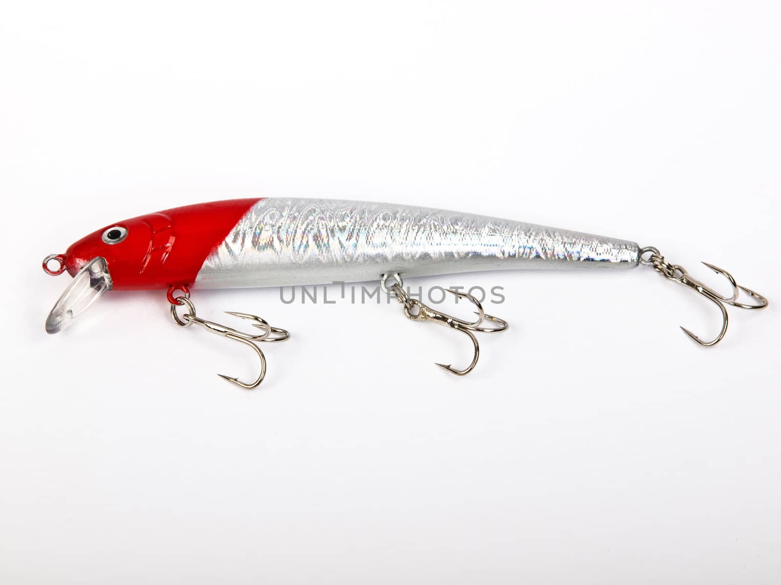 red and white fishing lure ready for the big fish