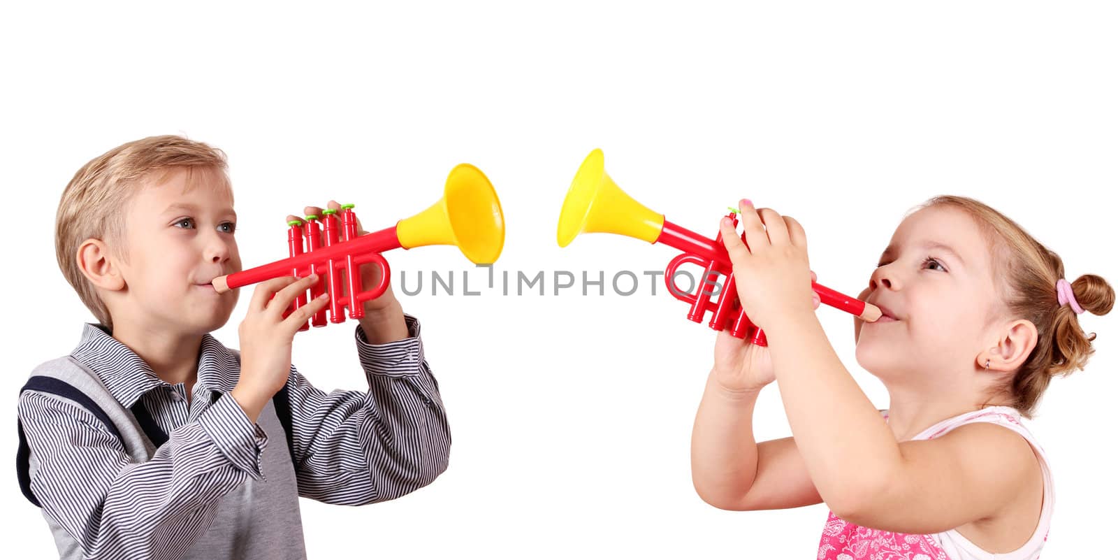 boy and little girl play trumpet