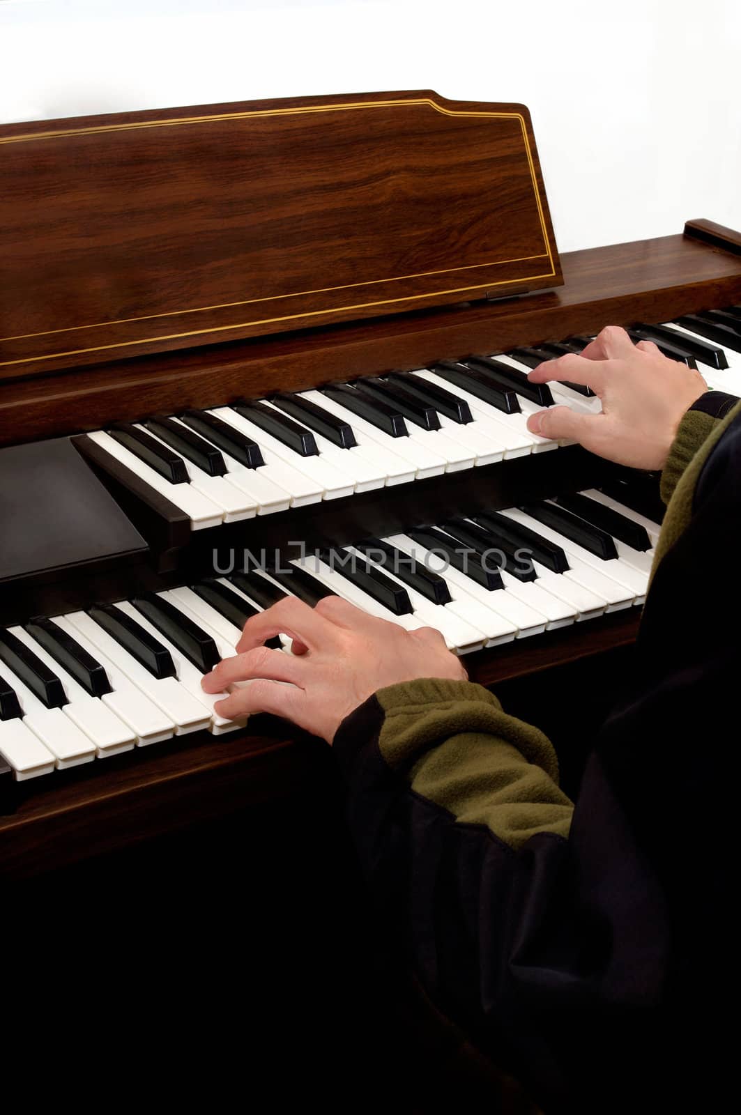 paino music lesson. hands playing keyboard of electronic musicial organ instrument