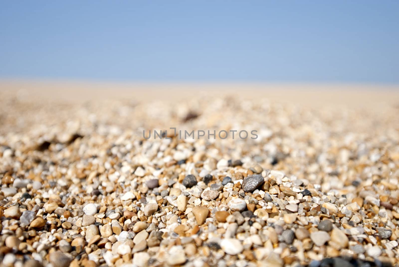 chesil beach pebbles going into distance