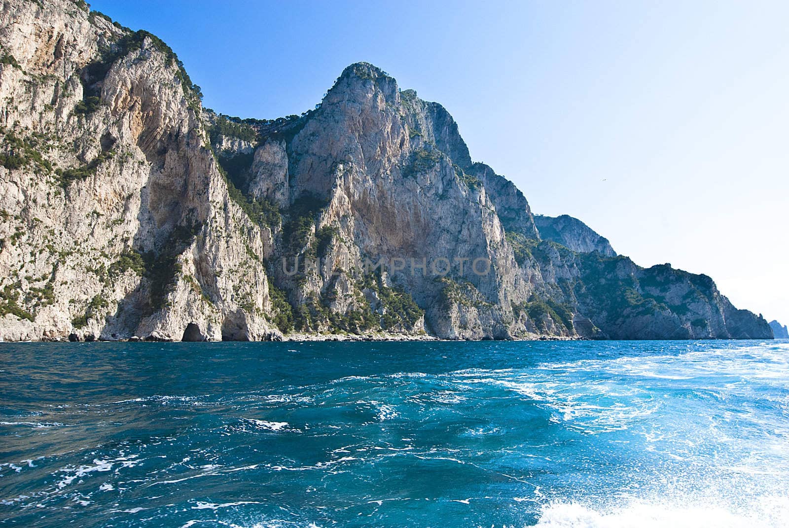 rugged cliffs falling into mediterannean sea capri, italy