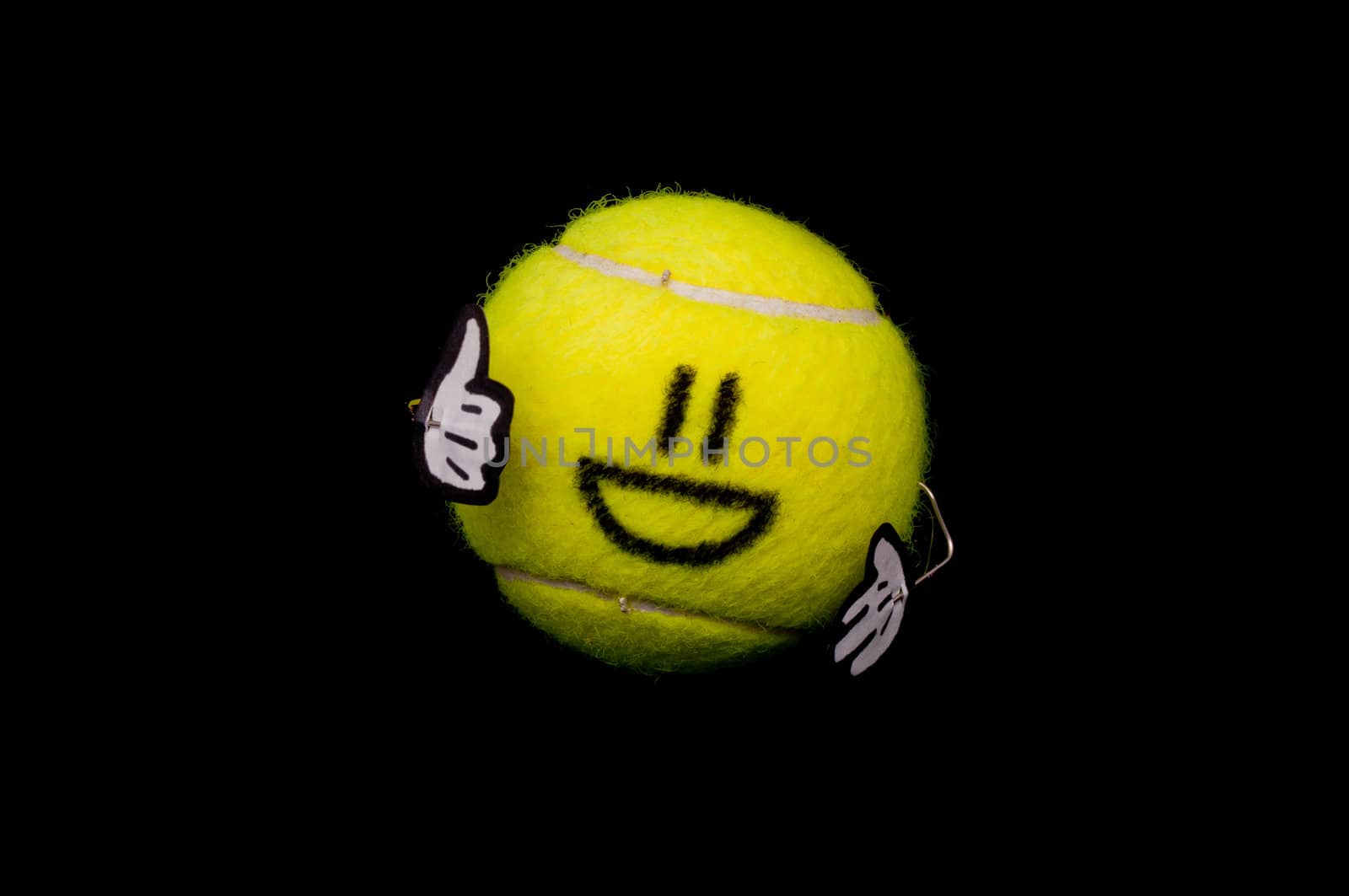 Cute ball shows the thumb and smiles a lot
