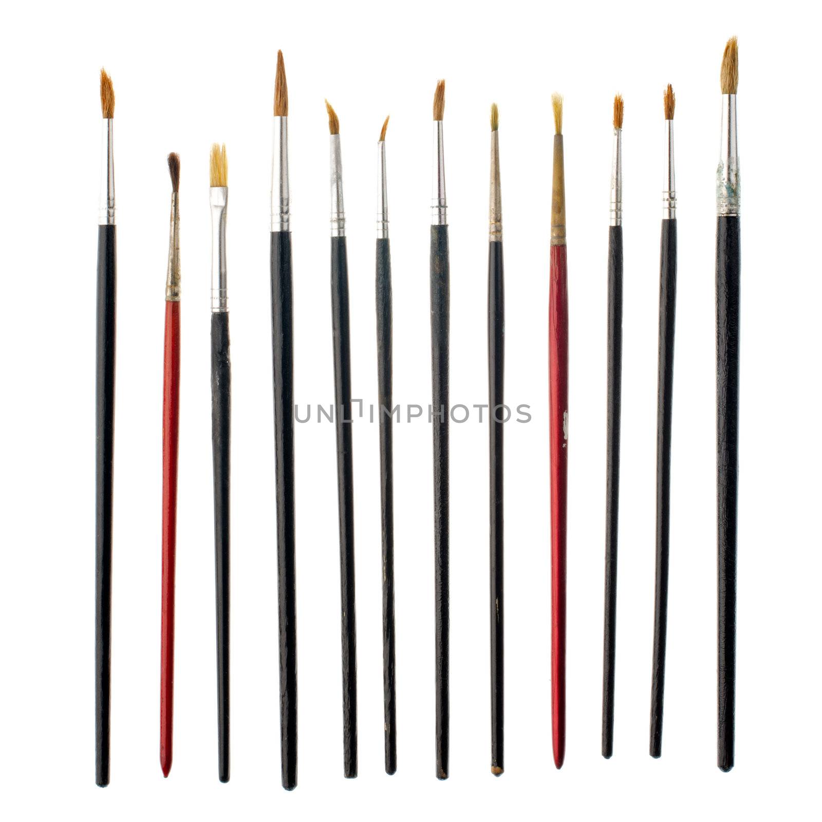 Different used art brushes isolated on white background.