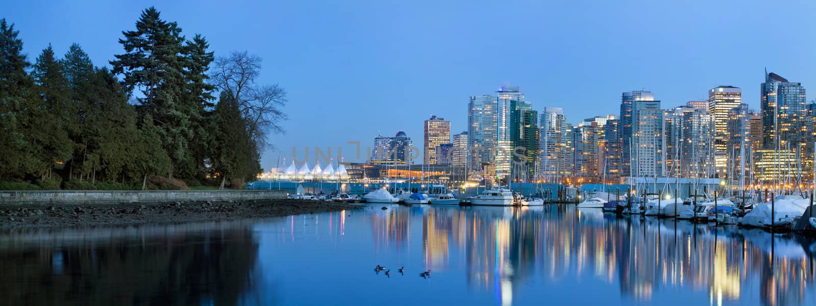 Vancouver BC Canada Skyline and Marina along False Creek from Stanley Park at Blue Hour Panorama