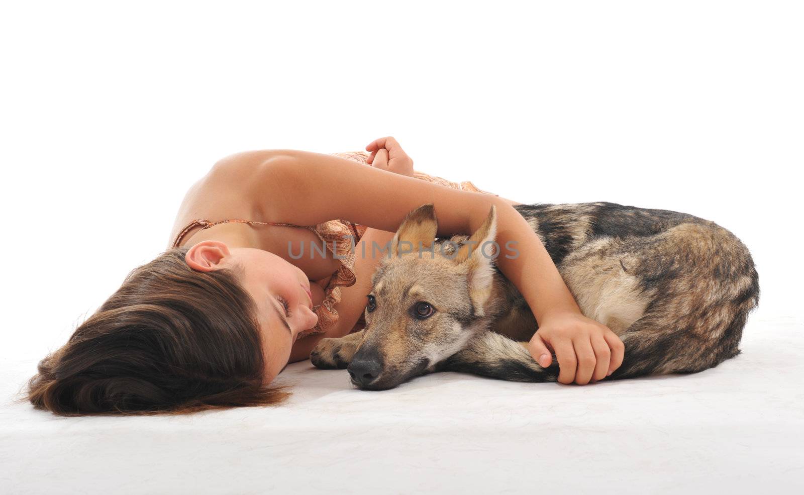 young girl and her puppy slovakia wolf sleeping together