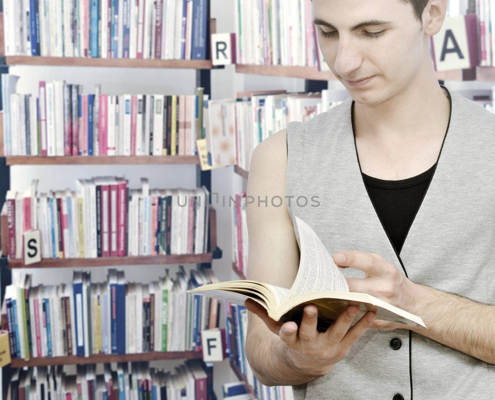 Young man studying in the library