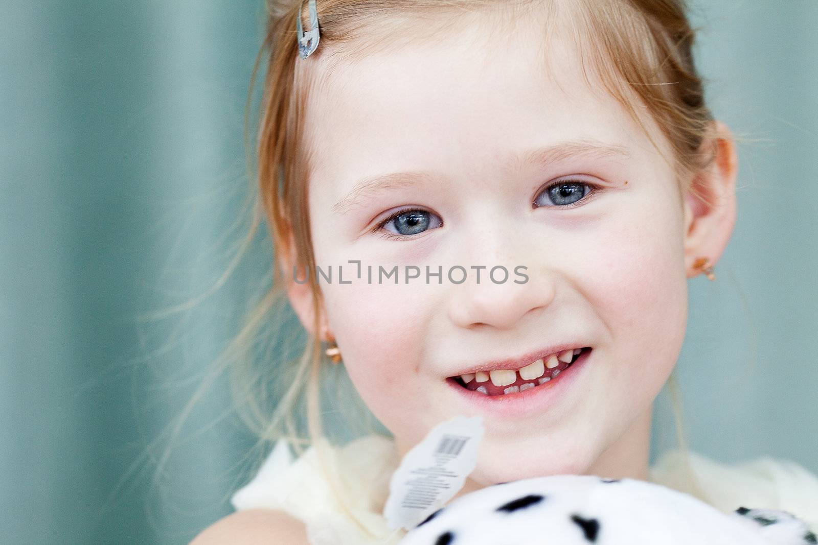 portrait of a beautiful little girl with a toy dog by jannyjus