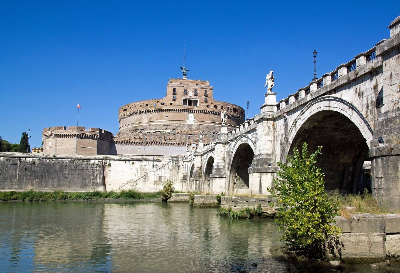 St Angel Castle and bridge, seen from one bank of the Tiber (Rome Italy)