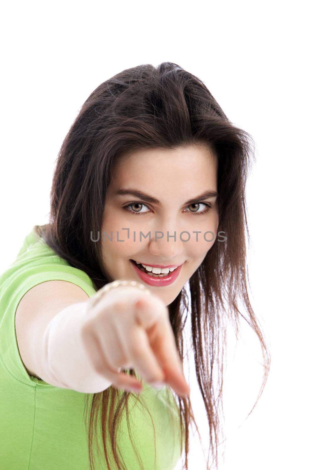 Portrait of beautiful young woman pointing at you