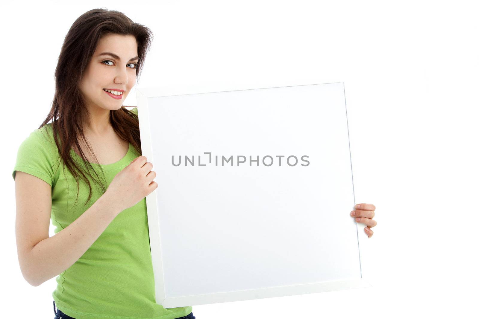 Smiling female showing a blank white board in a close up portrait