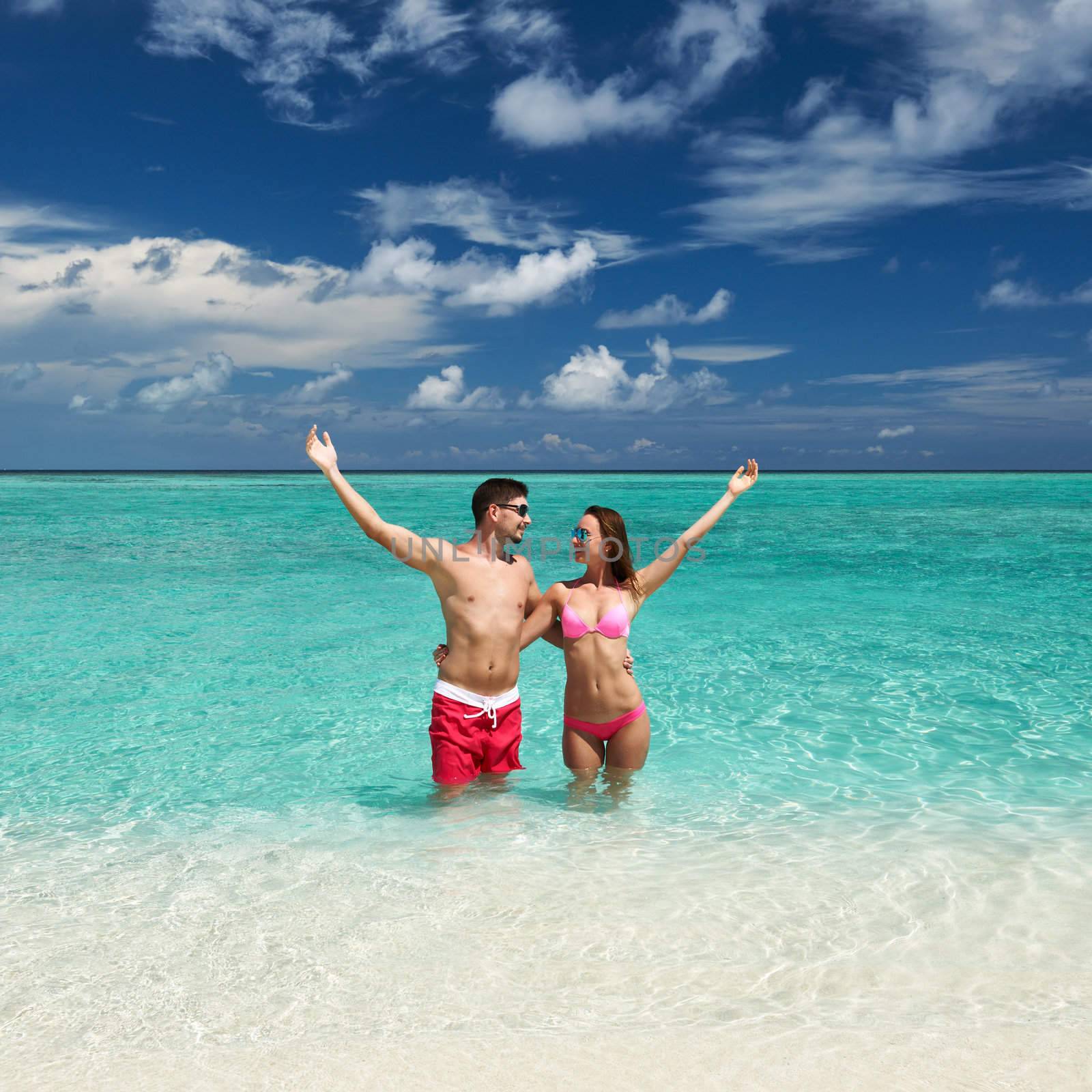 Couple on a tropical beach at Maldives