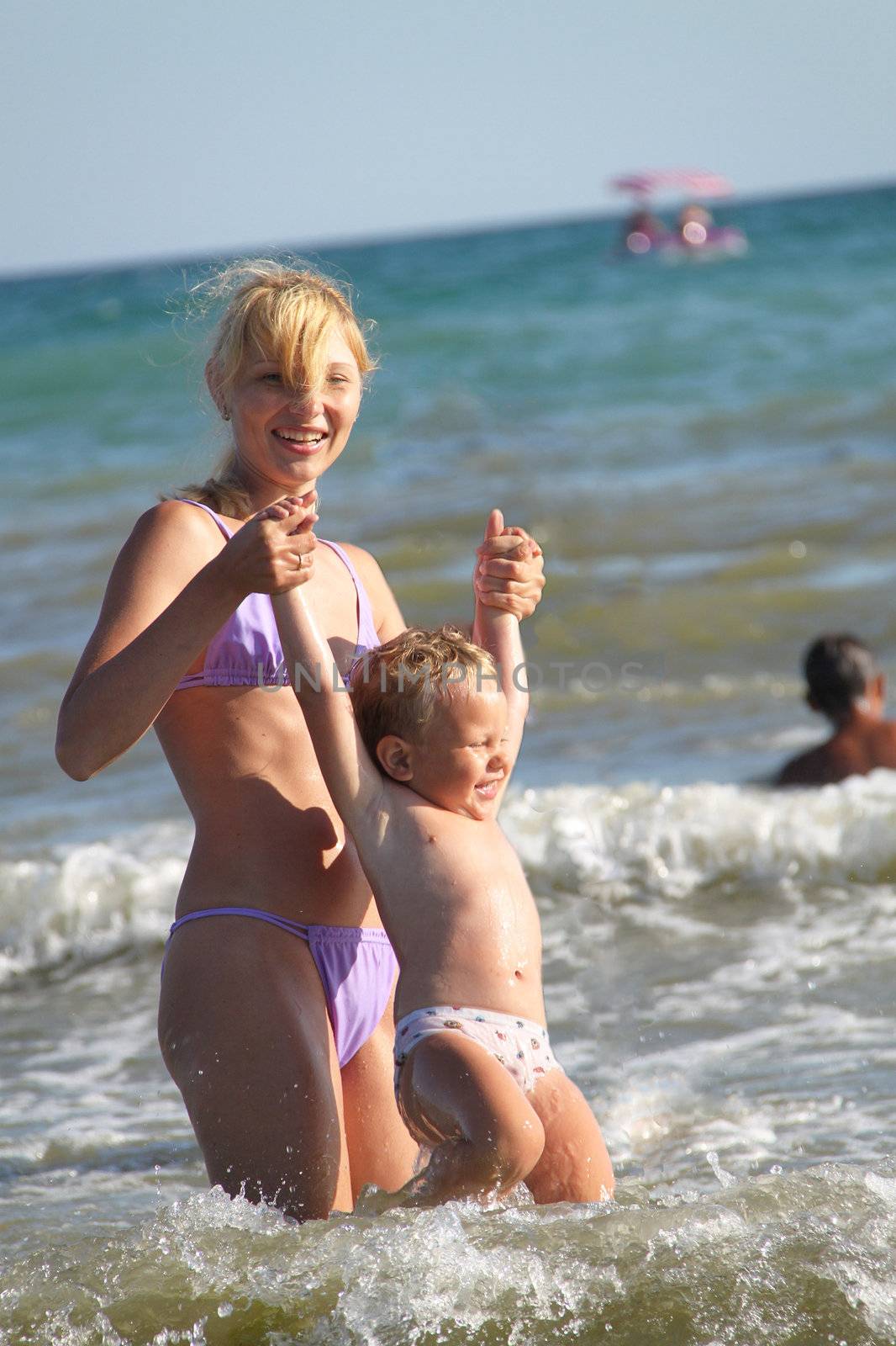 Mom and son at sea by NickNick