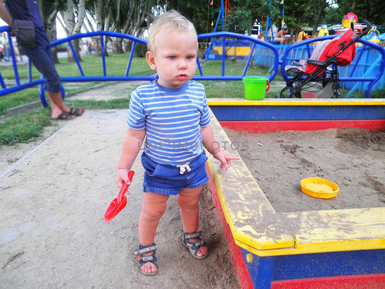 The kid in the playground by NickNick