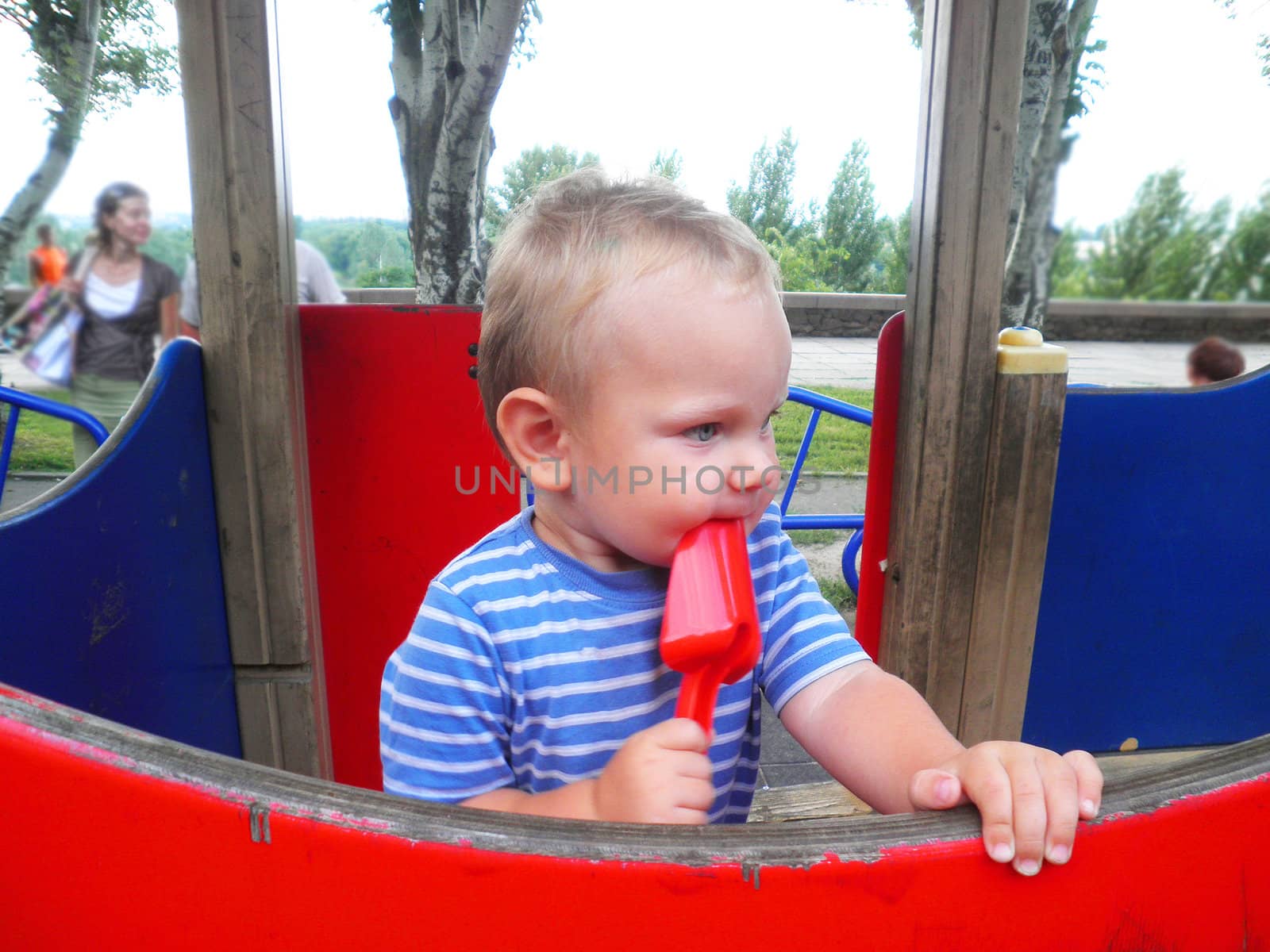 The kid in the playground by NickNick