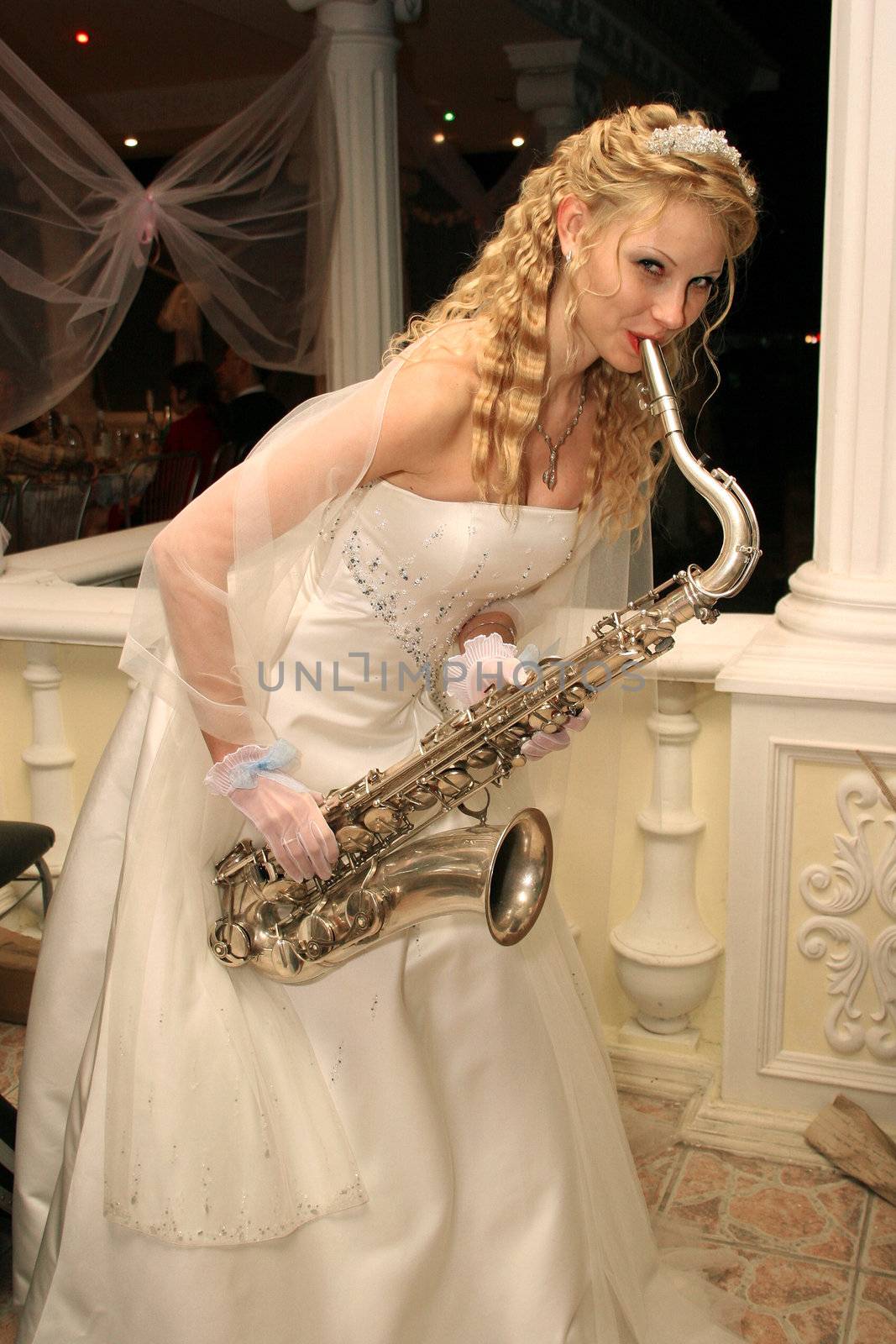 Bride plays the saxophone by NickNick